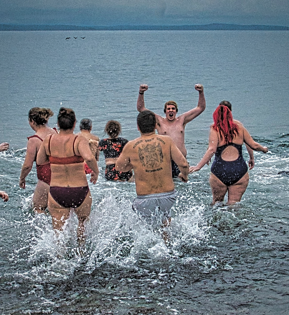 Alki Polar Plunge sees huge turnout for New Years day 2023 Westside